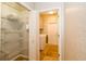 Pantry with wire shelving connecting to the laundry room with a newer washer and dryer at 27130 Firebush Dr, Wesley Chapel, FL 33544