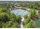 An aerial view of a neighborhood sports court featuring basketball and other games at 28683 Lucero Ln, Wesley Chapel, FL 33543