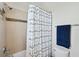 Bathroom with shower, shower curtain and towel rack at 28683 Lucero Ln, Wesley Chapel, FL 33543