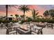 Outdoor lounge area with fire features and seating at 29536 Zupetta Ln, Wesley Chapel, FL 33545