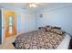 Comfortable bedroom with carpet, closet space, and a large window at 2983 Covewood Pl, Clearwater, FL 33761