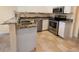 Well-equipped kitchen with stainless steel appliances and granite countertops at 2983 Covewood Pl, Clearwater, FL 33761
