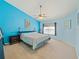 Spacious main bedroom with vaulted ceiling, ceiling fan, and plenty of natural light at 2983 Covewood Pl, Clearwater, FL 33761