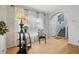 Welcoming foyer with stairway and stylish decor, offering a glimpse into the home's layout at 30130 Mossbank Dr, Wesley Chapel, FL 33543