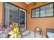 Relaxing outdoor patio with a view into the living room at 30130 Mossbank Dr, Wesley Chapel, FL 33543