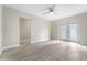 Open bedroom features bright walls and french doors leading to the backyard at 3214 E Maritana Dr, St Pete Beach, FL 33706