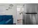 The kitchenette features stainless steel appliances, including a refrigerator at 3214 E Maritana Dr, St Pete Beach, FL 33706