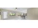 Open living space featuring tile floors, neutral paint, fan and plenty of natural light at 3214 E Maritana Dr, St Pete Beach, FL 33706
