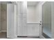 Mud room features a door to the back yard, cabinets, and tile floor at 3214 E Maritana Dr, St Pete Beach, FL 33706