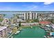 Stunning aerial view of waterfront property and surrounding area, featuring canals and buildings at 400 Larboard Way # 103, Clearwater, FL 33767