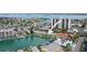 Scenic aerial perspective of waterfront condos with boat docks and ocean views at 400 Larboard Way # 103, Clearwater, FL 33767