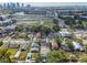 Scenic aerial shot of the property, surrounded by greenery, a bridge, and a cityscape, offering a unique perspective at 413 W Park Ave # 1, Tampa, FL 33602