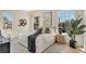 Bright bedroom with a large bed, accent lighting, and stylish decor for a serene living experience at 413 W Park Ave # 1, Tampa, FL 33602