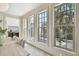 Bright dining room with views of the backyard, open to kitchen, and natural light at 413 W Park Ave # 1, Tampa, FL 33602