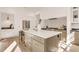 Spacious kitchen with a large island, stainless steel appliances, and modern cabinetry for cooking and entertaining at 413 W Park Ave # 1, Tampa, FL 33602