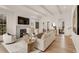 Airy living room with hardwood floors, fireplace, and seamlessly integrated open-concept design at 413 W Park Ave # 1, Tampa, FL 33602
