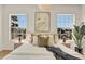 Bright bedroom with plush bedding, neutral decor, and natural light creating a comfortable and inviting atmosphere at 413 W Park Ave # 1, Tampa, FL 33602