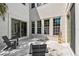 Cozy outdoor space with travertine flooring, a serene atmosphere, and modern seating options for relaxation at 413 W Park Ave # 1, Tampa, FL 33602