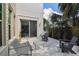 Outdoor patio featuring modern seating, travertine flooring, and a peaceful atmosphere for relaxing and entertaining at 413 W Park Ave # 1, Tampa, FL 33602