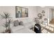 Inviting sitting area featuring a plush sectional sofa, modern artwork, and stylish decorative pieces at 413 W Park Ave # 1, Tampa, FL 33602