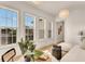 Cozy sitting area filled with natural light, showcasing stylish seating arrangements and modern décor at 413 W Park Ave # 1, Tampa, FL 33602
