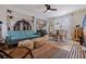 Bright and airy living room featuring hardwood floors, eclectic furniture, and an open layout perfect for relaxation and entertaining at 4426 3Rd N Ave, St Petersburg, FL 33713
