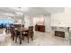 Elegant dining area featuring tile floors, a mirrored wall, and a stunning view of the ocean at 450 S Gulfview Blvd # 802, Clearwater Beach, FL 33767