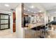 Bright kitchen boasts granite counters, stainless appliances, and a convenient breakfast bar with seating at 450 S Gulfview Blvd # 802, Clearwater Beach, FL 33767