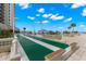 Shuffleboard court with ocean views and blue sky at 450 S Gulfview Blvd # 802, Clearwater Beach, FL 33767