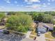 An aerial view of the property showcasing its neighborhood and landscaping at 4606 Copper Ln, Plant City, FL 33566