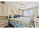 Inviting bedroom with natural light, hardwood floors, and comfortable furnishings at 4606 Copper Ln, Plant City, FL 33566