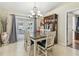 Comfortable dining room area offering a hutch for storage and outdoor patio access at 4606 Copper Ln, Plant City, FL 33566