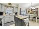 Bright kitchen with stainless appliances and a view to the dining room table at 4606 Copper Ln, Plant City, FL 33566