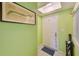 Bright foyer featuring a golf course map, tiled floors, and an umbrella stand at 4611 Duhme Rd # 1A, St Petersburg, FL 33708