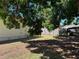 The home features a spacious partially shaded backyard with a fence at 5211 Jersey S Ave, Gulfport, FL 33707
