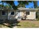 Inviting single-story home with mature trees and fresh landscaping at 5211 Jersey S Ave, Gulfport, FL 33707