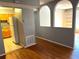 Open-concept living room with a view of the kitchen at 5211 Jersey S Ave, Gulfport, FL 33707