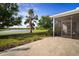 Covered and screened back porch overlooking a pond at 5460 Sandy Shell Dr, Apollo Beach, FL 33572