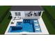 Aerial rendering highlighting a pool with jacuzzi, in-pool seating, and outdoor lounge area connected to the house at 5460 Sandy Shell Dr, Apollo Beach, FL 33572