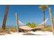Secluded hammock on the beach with palm trees in view at 5500 Gulf Blvd # 4228, St Pete Beach, FL 33706
