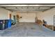 Spacious garage with ample storage space and a clean, well-maintained interior at 606 Winterside Dr, Apollo Beach, FL 33572