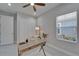 Bright office space featuring a modern desk, chair, closet, and a window with natural light at 606 Winterside Dr, Apollo Beach, FL 33572