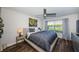 Primary bedroom featuring a serene waterfront view and modern furnishings at 6141 Bahia Del Mar Blvd # 129, St Petersburg, FL 33715