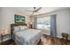 Cozy bedroom with a comfortable bed, neutral decor, and natural light from a window at 6141 Bahia Del Mar Blvd # 129, St Petersburg, FL 33715