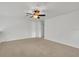 Bonus room featuring neutral carpet, light walls, and ceiling fan at 6205 Ibispark Dr, Lithia, FL 33547