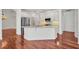 Modern kitchen with granite countertops, stainless steel appliances, and white cabinetry at 6205 Ibispark Dr, Lithia, FL 33547