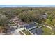 Aerial shot showing neighborhood homes, mature trees and proximity to downtown at 6302 N 39Th St, Tampa, FL 33610