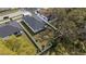 Aerial view of a home's fenced backyard, showcasing the well-maintained lawn at 6302 N 39Th St, Tampa, FL 33610