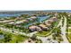 Aerial view showing the property's neighborhood, canal, and landscaping at 6317 Marbella Blvd, Apollo Beach, FL 33572