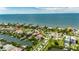 Waterfront home with a private boat dock offers stunning ocean views in a desirable neighborhood at 6317 Marbella Blvd, Apollo Beach, FL 33572